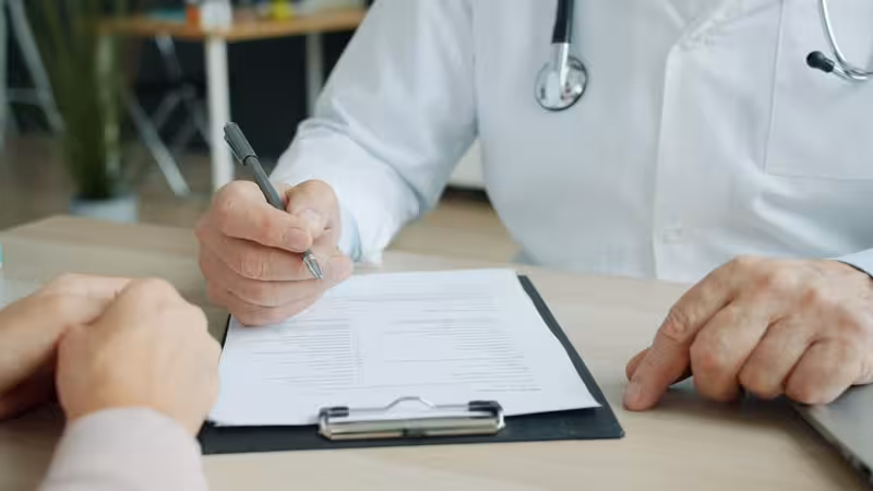 Choosing the Most Convenient Way to Travel: A doctor and patient during a consultation Doctor and patient consultation for Choosing the Most Convenient Way to Travel - Travel Time To Muswell Hill: Private Micros...
